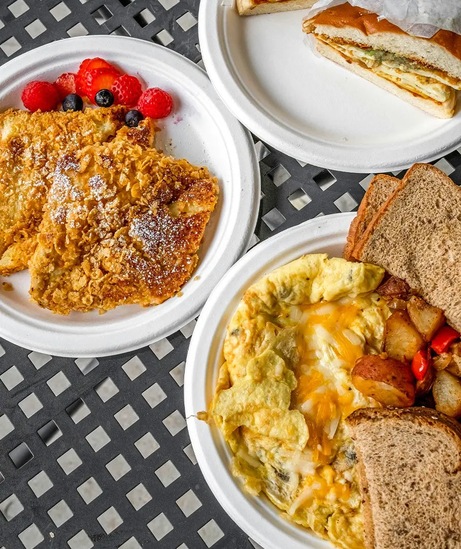 White Compostable Bagasse 9-Inch Round Plates - 500/Case